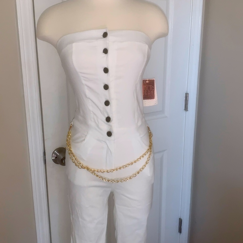 I am selling a size small button down white jumpsuit w/ removable gold chains.